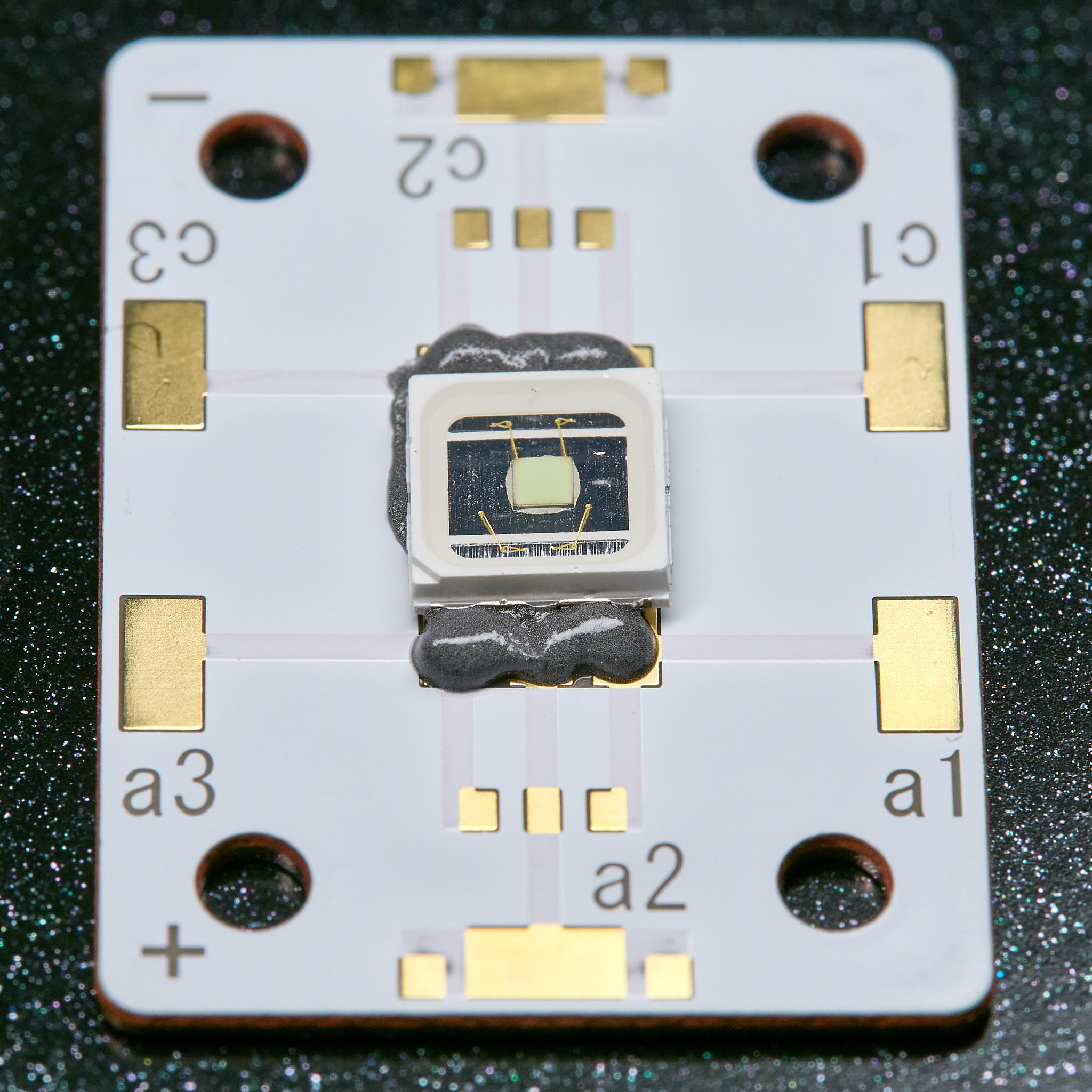 The LED sitting on the solder paste (cold)