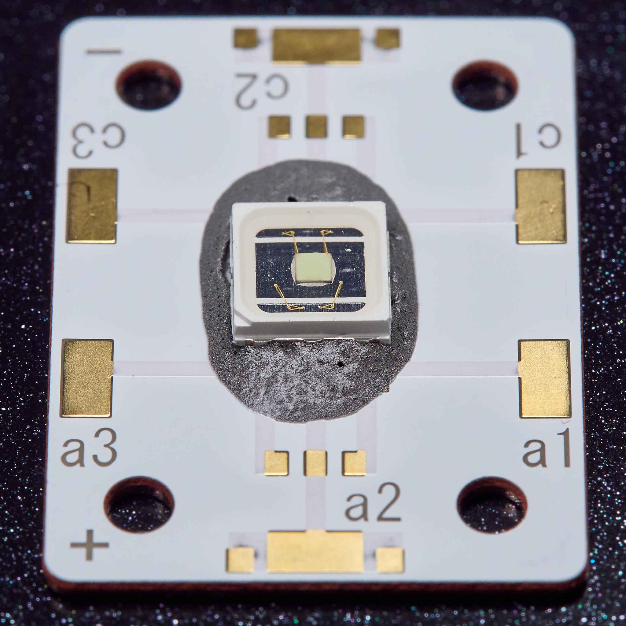 The solder beads in the paste start to melt